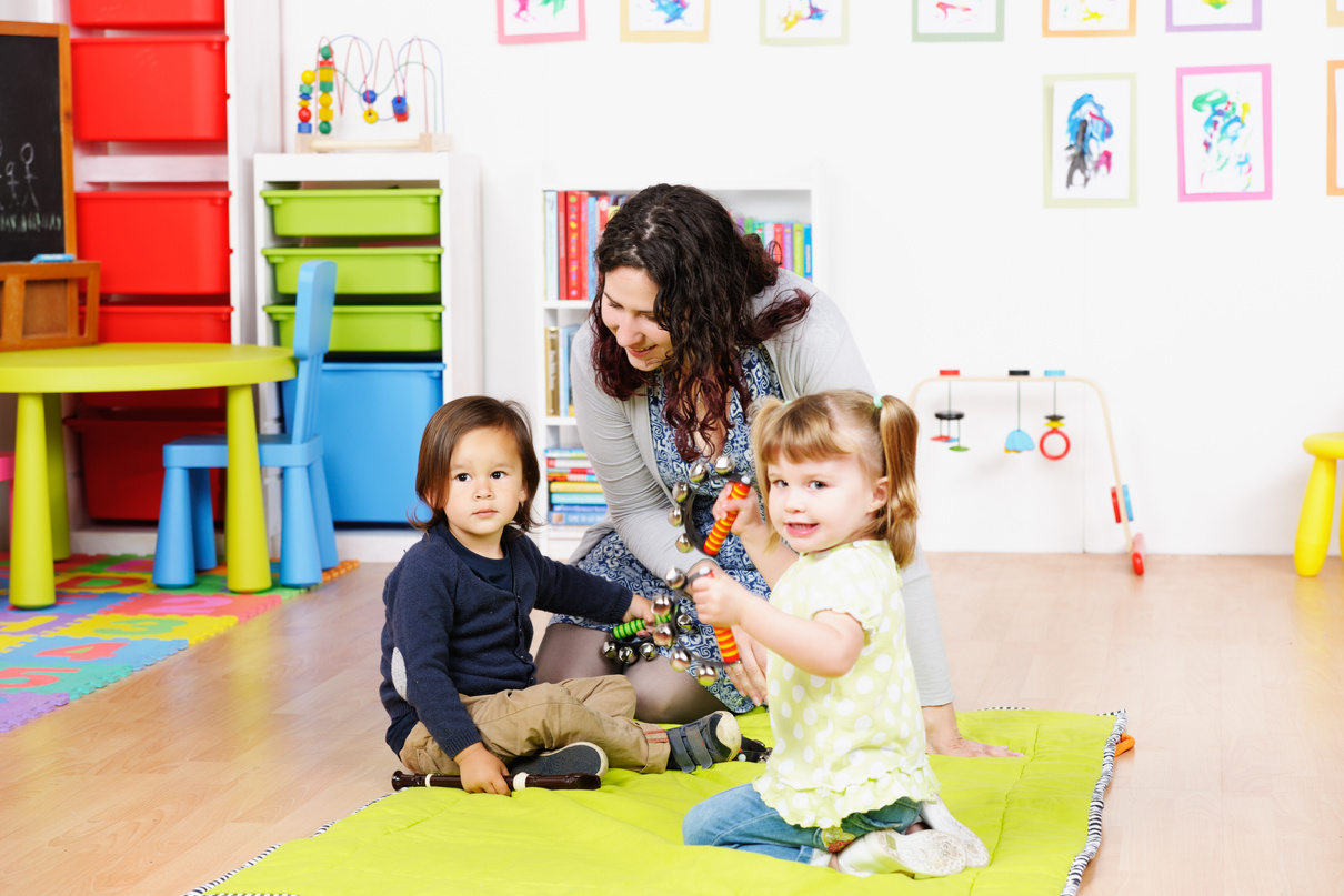 Little Children with their Music Teacher